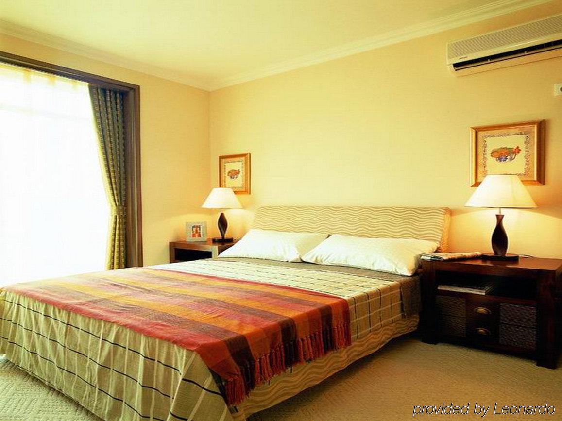 Beijing Jinqiao Apartment Hotel Oda fotoğraf